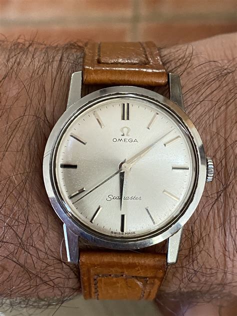 manual winding omega watch.